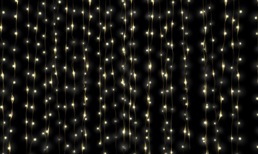 A curtain of illuminated fairy lights