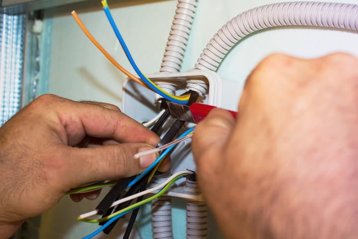Electricians clears wire for electricity installation