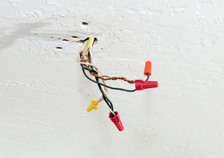 Exposed wires with wire nuts